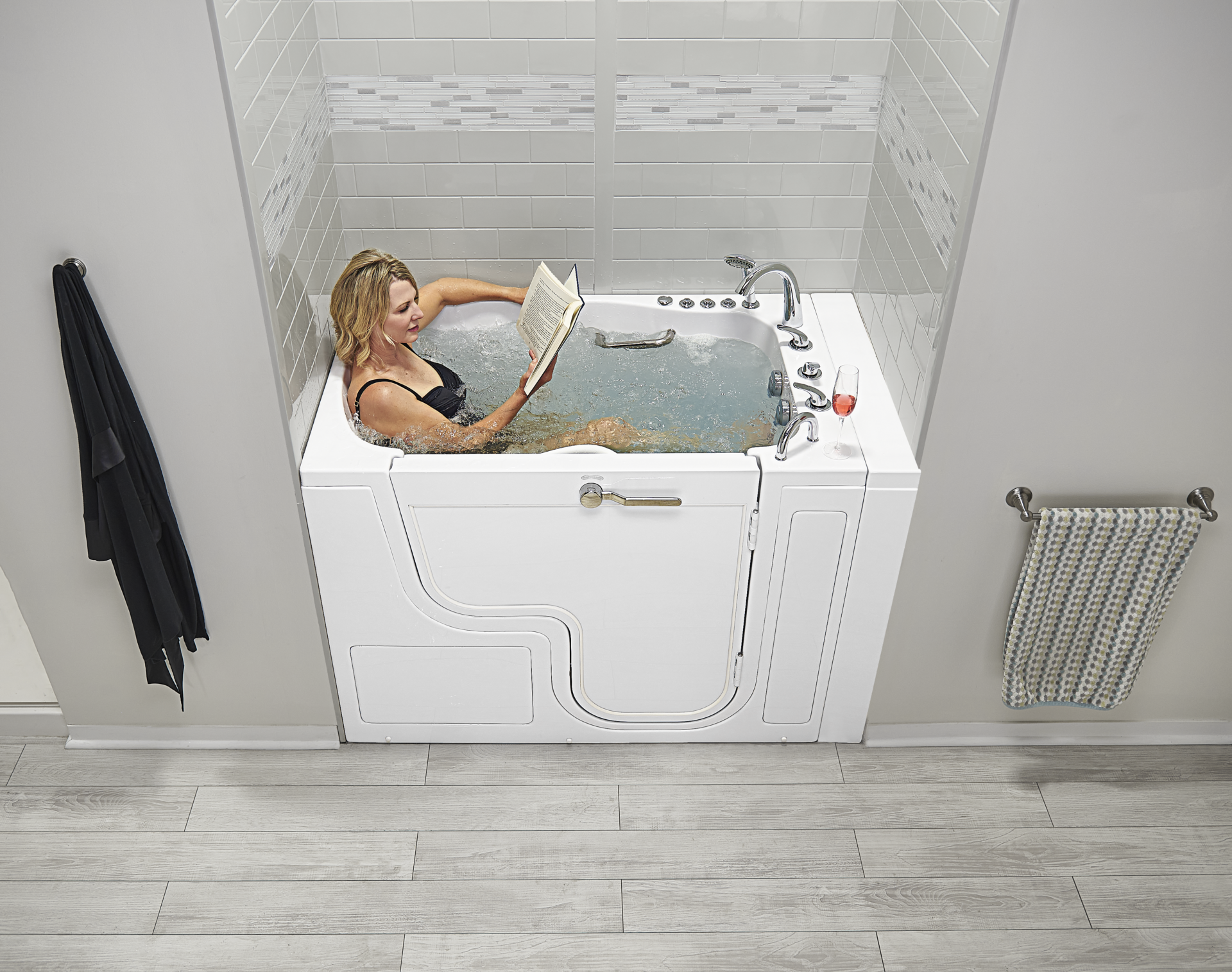 Person relaxing in a walk-in tub — product example